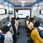 Children exploring digital Learning Centre in Delhi.