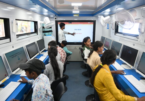 Children exploring digital Learning Centre in Delhi.